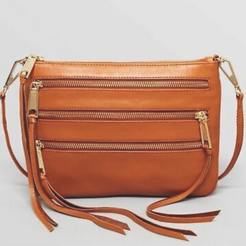 Rebecca Minkoff 3 zipper tan crossbody with silver hardware.